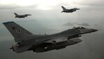 In this file photo, pilots from the 35th Fighter Squadron (FS) conduct a training mission over the South Korean peninsula. Pilots assigned to the 35th FS utilize training missions to simulate actual conditions they may face in combat and keep their war-fighting skills honed. 