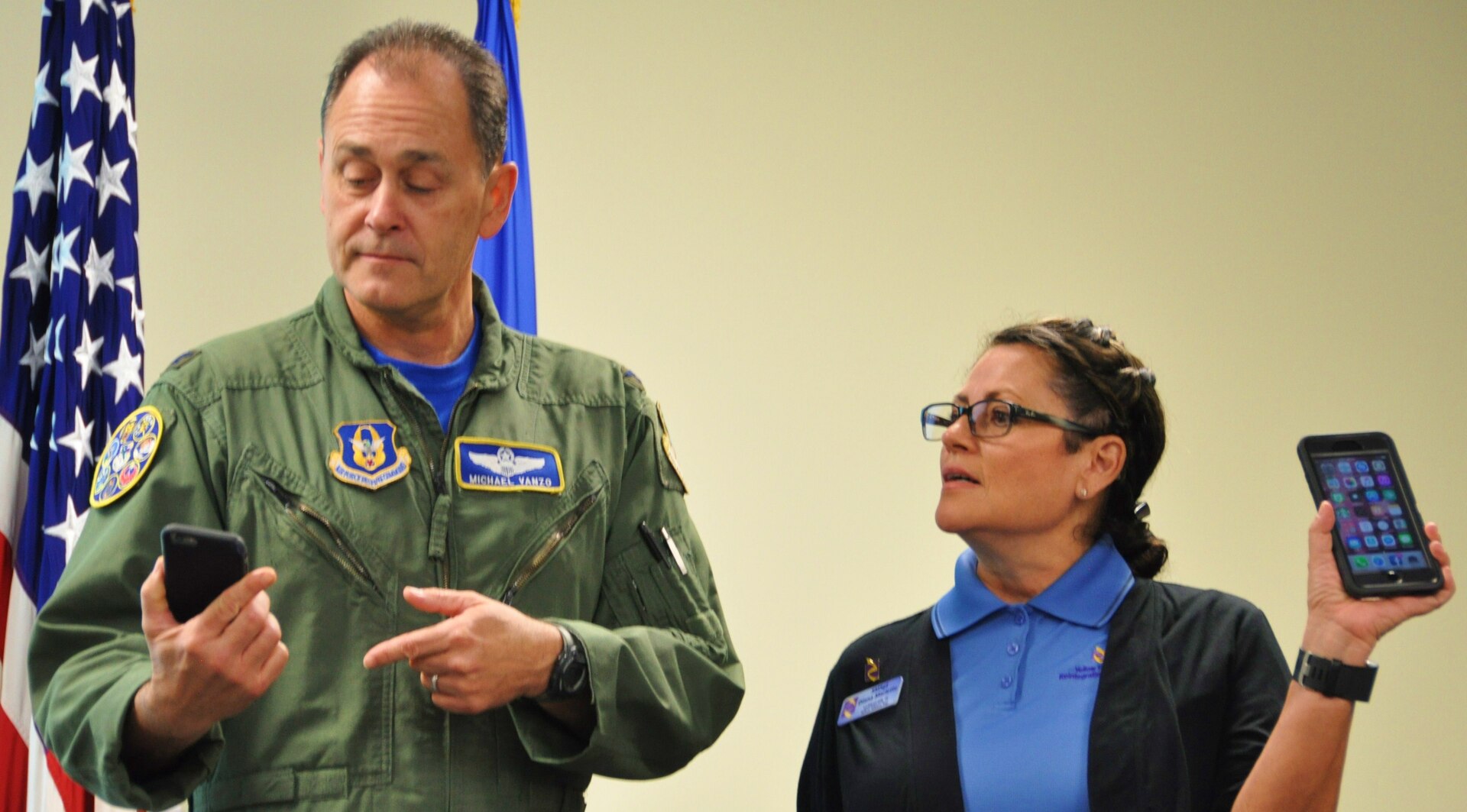 Col. Michael Vanzo, 340 Flying Training Group Director of Operations, explores the Wingman Toolkit with Senior Master Sgt. Diana Marlette, Yellow Ribbon Program event coordinator with the 433rd Airlift Wing at Joint Base San Antonio-Lackland, Texas. Marlette briefed 340 FTG Citizen Airmen on the YRP during the unit's spring MUTA at Joint Base San Antonio-Randolph, Texas on June 8-9. (Photo by Janis El Shabazz, 340 FTG Public Affairs).