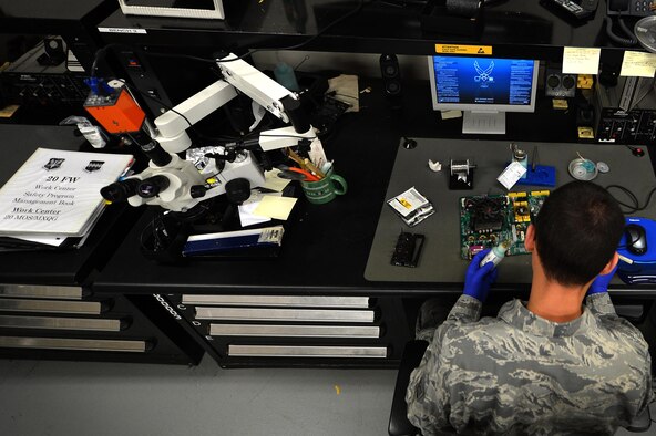 U.S. Air Force Staff Sgt. Alexander Creznic, 20th Maintenance Group Air Force Repair Enhancement Program (AFREP) technician, prepares to solder a computer’s motherboard at Shaw Air Force Base, S.C., June 12, 2017. AFREP Airmen repair items from every squadron on base not under government contracts. (U.S. Air Force photo by Airman 1st Class Christopher Maldonado)