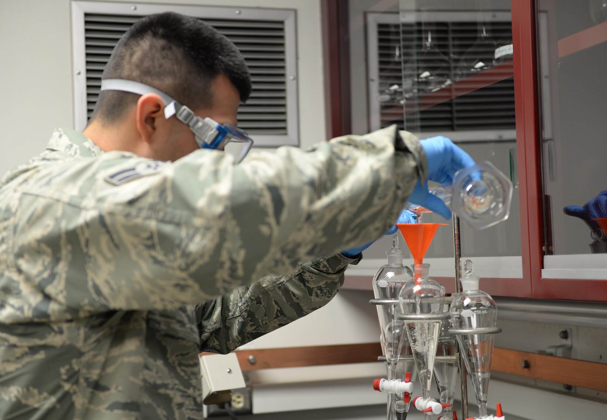 U.S. Air Force Airman 1st Class Armondo Velasquez, a 354th Logistics Readiness Squadron fuels lab technician, conducts a Fuels System Icing Inhibitor (FSII) test June 12, 2017, at Eielson Air Force Base, Alaska. The FSII test is one of several tests fuels lab personnel carry out periodically to ensure clean, dry fuel is issued to aircraft. (U.S. Air Force photo by Airman 1st Class Cassandra Whitman)