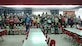 U.S. Air Force Master Sgt. Anthony Molina, 97th Maintenance Directorate inspection managements flight chief, and students from Duke Elementary School pose for a photo, May 17, 2017, at Duke Elementary School, Oklahoma. The students of Duke Elementary received a U.S. flag that had been flowing during combat operations overseas as thanks for writing deployed members during the holidays. (Courtesy Photo/Released).