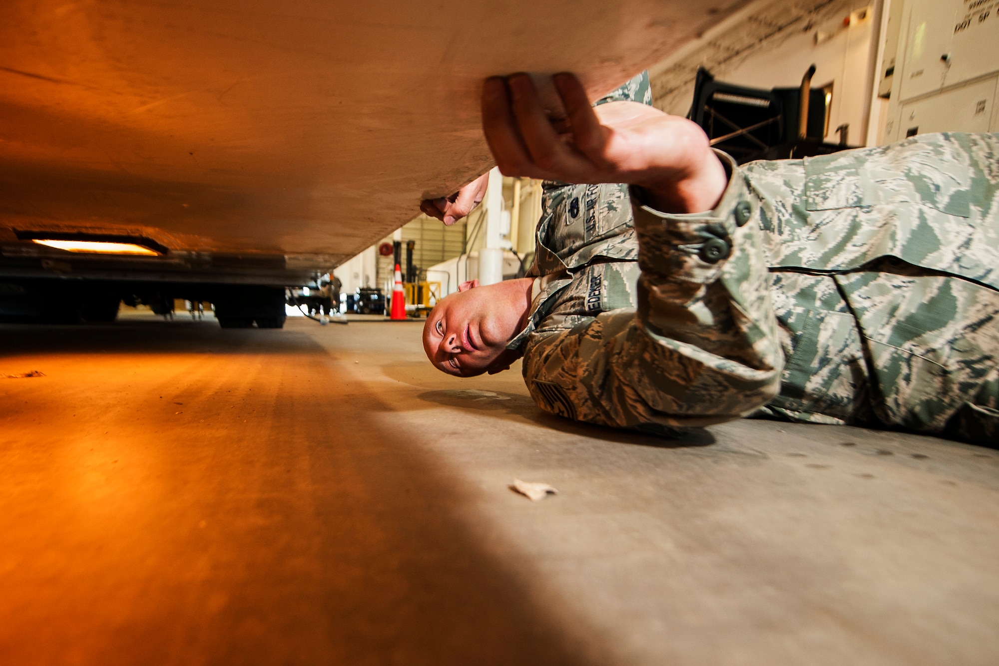Tech. Sgt. Carl Snedeker, 91st Maintenance Group facility maintenance section site supervisor, inspects a payload transport trailer’s lights during Global Strike Challenge training at Minot Air Force Base, N.D., May 31, 2017. Snedeker is an alternate technician for the three-member PREL crew for GSC 17. (U.S. Air Force photo/Senior Airman J.T. Armstrong)