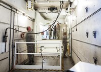 The 91 Maintenance Group power, refrigeration, electrical, laboratory Global Strike Challenge team works inside a payload transport trailer at Minot Air Force Base, N.D., May 31, 2017. The three-member PREL team is responsible for the inspection and maintenance of the payload transport trailer’s electrical systems and environmental climate control. (U.S. Air Force photo/Senior Airman J.T. Armstrong)