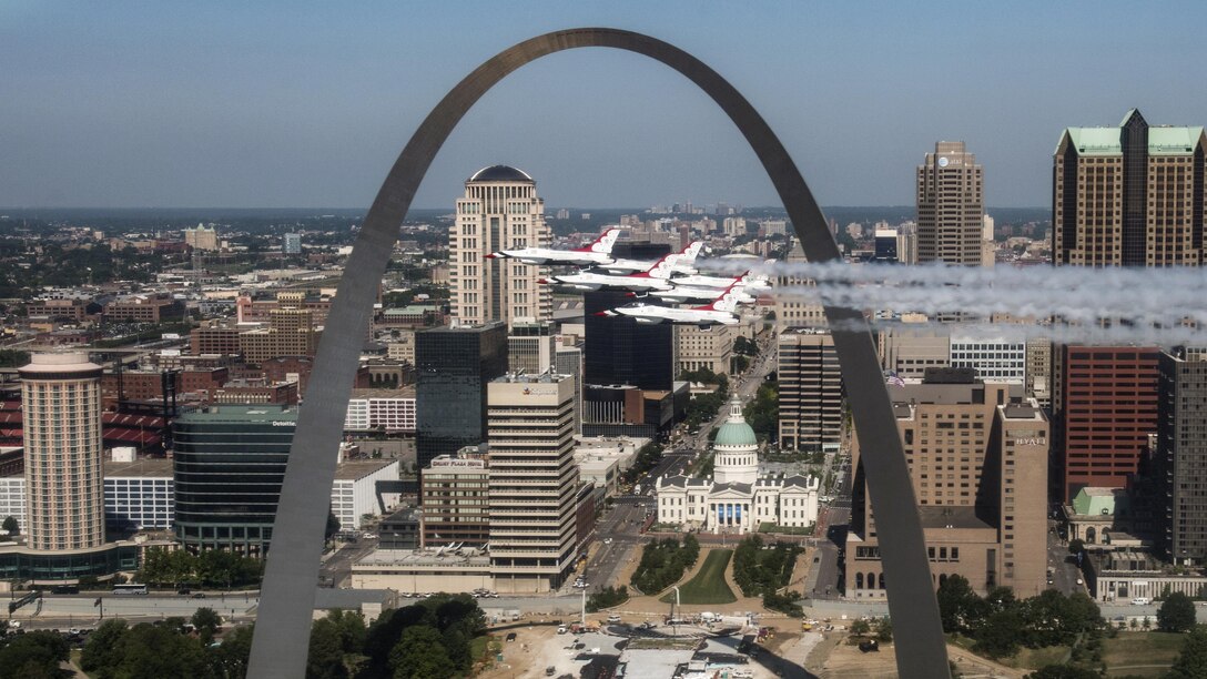 The Thunderbirds, the Air Force flight demonstration squadron, fly by the Gateway Arch in St. Louis, June 12, 2017, while returning to Nellis Air Force Base, Nev. Air Force photo by Tech. Sgt. Christopher Boitz