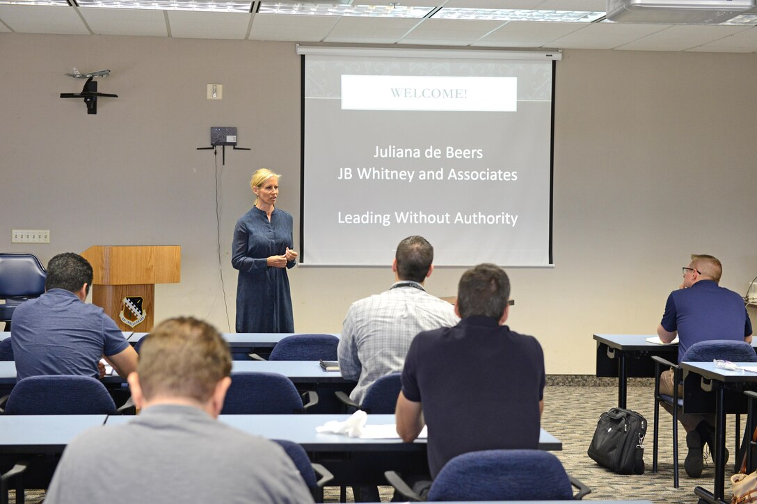 Juliana de Beers of J.B. Whitney and Associates, a company that specializes in training and career development, speaks at a technical symposium put on by the 412th Test Wing June 5. Some non-technical presenters were available to discuss career development and workplace improvement. (U.S. Air Force photo by Kenji Thuloweit) 