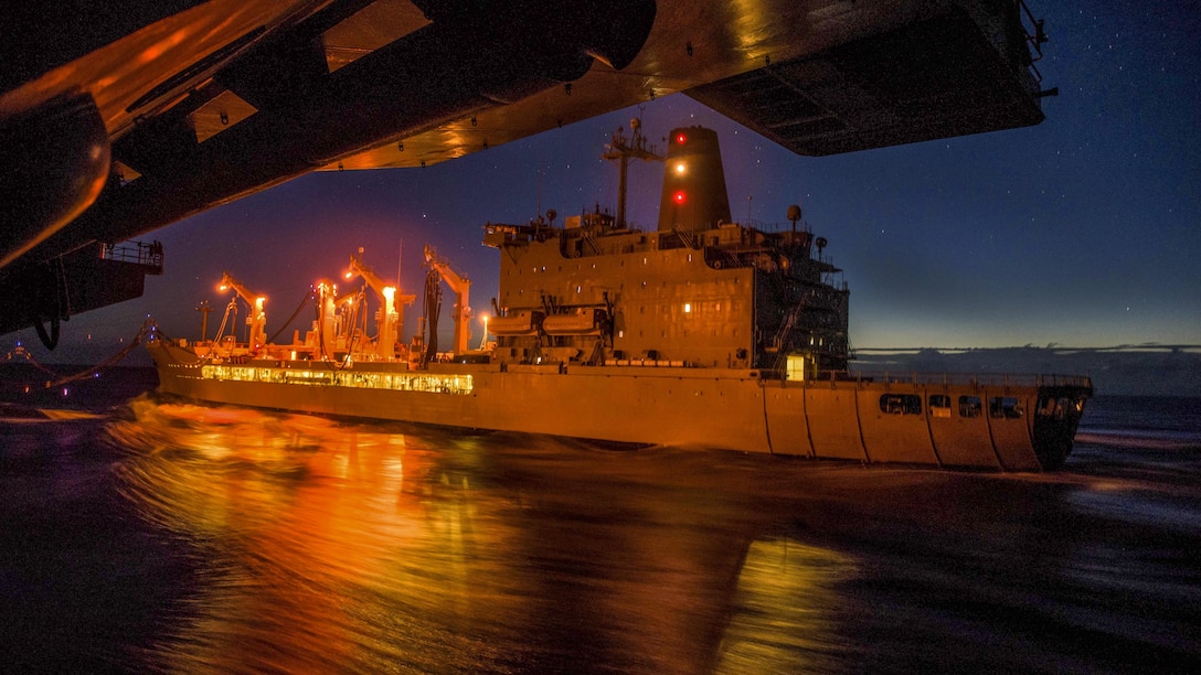 The USNS John Ericsson steams alongside the USS Ronald Reagan during a replenishment in the Philippine Sea, June 6, 2017. The Reagan provides a combat-ready force that protects and defends the collective maritime interests of its allies and partners in the Indo-Asia-Pacific region. Navy photo by Petty Officer 2nd Class Kenneth Abbate