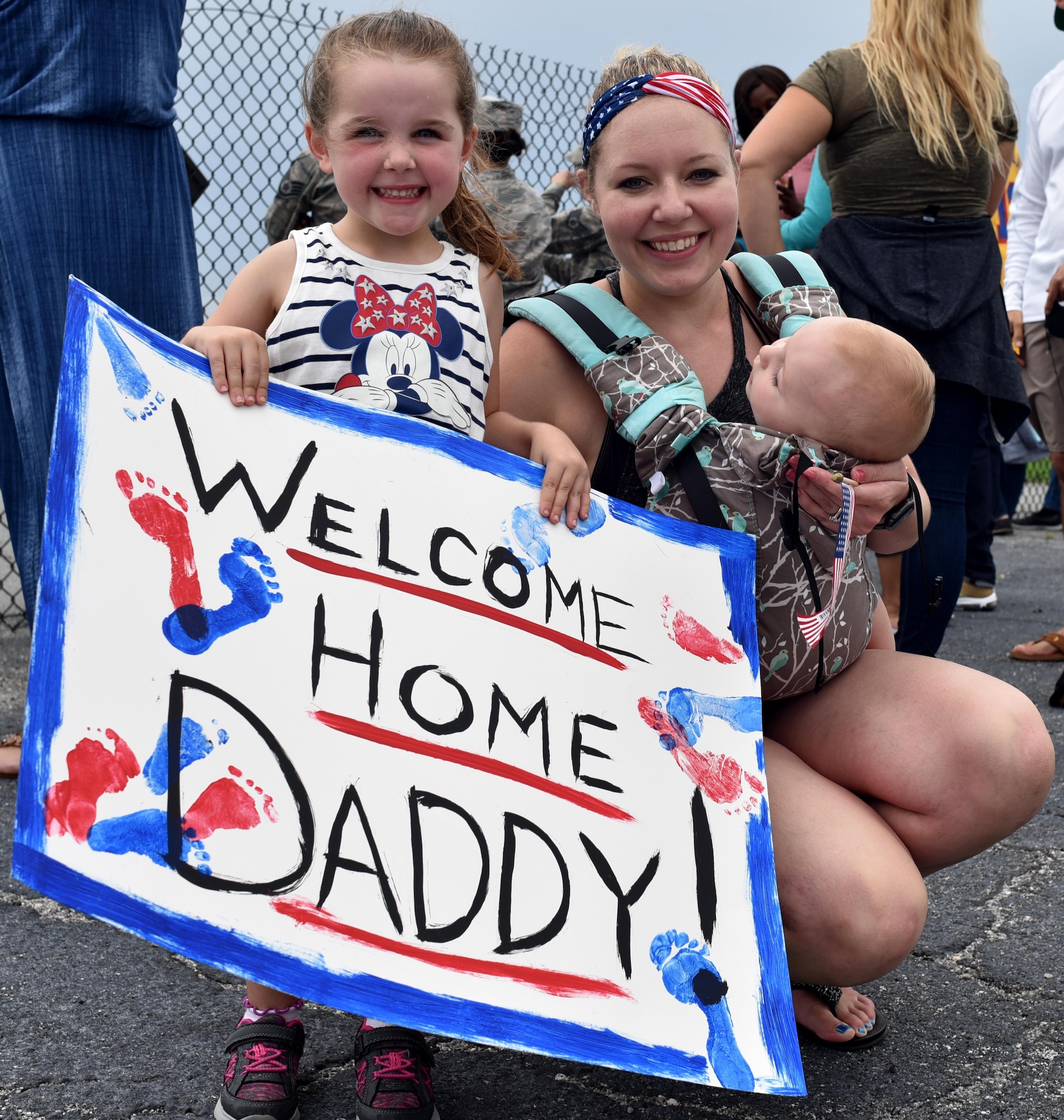 Approximately thirty Citizen Airman from the 920th Rescue Wing returned home from Afghanistan June 6 after providing personnel recovery support to ongoing operations for the last four months. Families, friends and pets gathered on base to greet their loved ones. (U.S. Air Force photo by Senior Airman Brandon Kalloo Sanes)
