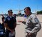 Technical Sgt. Joseph Olsen, an Air Transportation Specialist for the United States F-16 Thunderbirds team, talks with the top local reserve enlisted leader, 932nd Airlift Wing Command Chief Master Sgt. Chad Welch, about the Illinois unit's C-40C aircraft (seen in background).  Various wing members told their particular stories regarding their unique jobs to the general public at the Scott Air Show June 10, 2017, at Scott Air Force Base, Illinois.  (U.S. Air Force photo by Lt. Col. Stan Paregien)