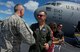 U.S. Air Force Maj. Gen. Mark Dillon, right, Pacific Air Forces vice commander, is greeted by Gen. Terrence J. O'Shaughnessy, Pacific Air Forces commander, moments after his C-17 fini-flight at Joint Base Pearl Harbor-Hickam, Hawaii, June 12, 2017. With Dillon's retirement approaching, the fini-flight is the capstone event in his flying career. (U.S. Air Force photo/Tech. Sgt. Kamaile Chan)