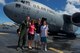 U.S. Air Force Maj. Gen. Mark Dillon, Pacific Air Forces vice commander, poses for a group photo with his family after being soaked in water and champagne moments after his C-17 fini-flight at Joint Base Pearl Harbor-Hickam, Hawaii, June 12, 2017. With Dillon's retirement approaching, the fini-flight is the capstone event in his flying career. (U.S. Air Force photo/Tech. Sgt. Kamaile Chan)