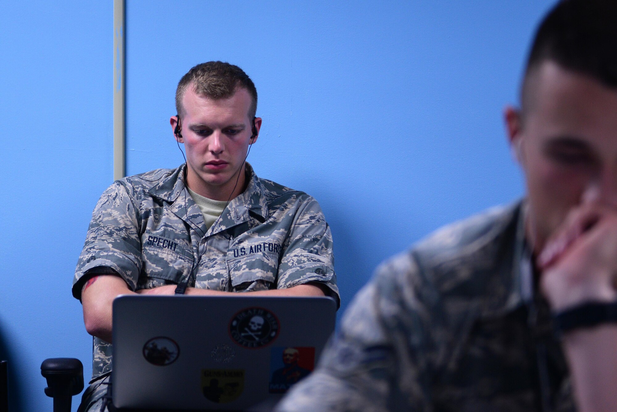 Airman Basic Gregory Specht, 338th Training Squadron student, studies course material in one of the cyber transport course’s ‘flipped’ classrooms in Bryan Hall, May 10, 2017, on Keesler Air Force Base, Miss. The squadron’s ‘flipped’ classrooms feature a student-centered approach where Airmen are able to work at their own pace in an environment that’s catered to student discovery and engagement instead of the normal educational trend of teacher-led instruction. (U.S. Air Force photo by Senior Airman Duncan McElroy) 