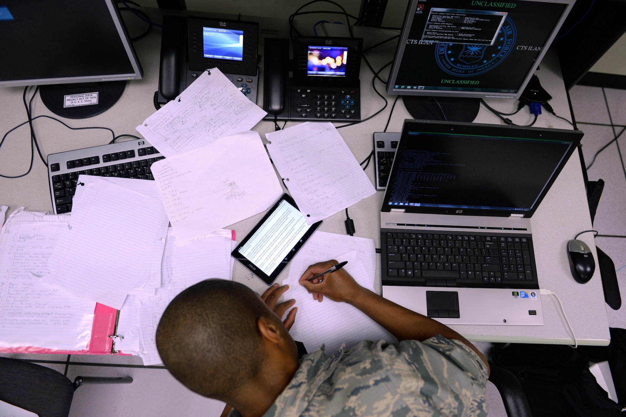 Airman Basic Andre Ivy, 338th Training Squadron student, does coursework in one of the cyber transport course’s ‘flipped’ classrooms in Bryan Hall, May 10, 2017, on Keesler Air Force Base, Miss. The squadron’s ‘flipped’ classrooms feature a student-centered approach where Airmen are able to work at their own pace in an environment that’s catered to student discovery and engagement instead of the normal educational trend of teacher-led instruction. (U.S. Air Force photo by Senior Airman Duncan McElroy) 