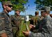 U.S. Air Force Tech. Sgt. Christopher Hardy, 7th Weather Squadron noncommissioned officer  in charge of regional weather maintenance, right, speaks with German NATO partners during a weather-related exercise in Wiesbaden, Germany, June 12, 2017. The 7th WS uses Exercise Cadre Focus to enhance its capability to provide weather support to U.S. Army operations in Europe. (Air Force photo by Airman 1st Class Joshua Magbanua) 