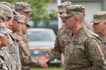 Director of the Army National Guard, Lt. Gen. Timothy J. Kadavy, greets Soldiers from HHC 2-136 Combined Arms Battalion, 34th Infantry Division, Minnesota National Guard, participating in Saber Strike 17, in Pabrade, Lithuania.  