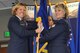 Brig. Gen. Ellen Moore (left), the HQ ARPC commander, passes the HQ RIO guidon to the organization's new commander, Col. Kelli B. Smiley, during a change of command ceremony, June 12. Smiley comes to HQ RIO after previously serving as the director of Total Force Services at HQ ARPC, which is responsible for providing personnel support to over 1 million Air Force Reserve, Air National Guard and retired Airmen.