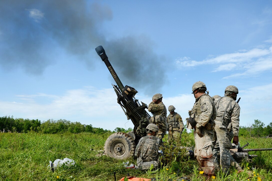 New York Army National Guardsmen fire an M119A2 howitzer during a live-fire at Fort Drum, N.Y., June 9, 2017. Army National Guard photo by Pfc. Andrew Valenza