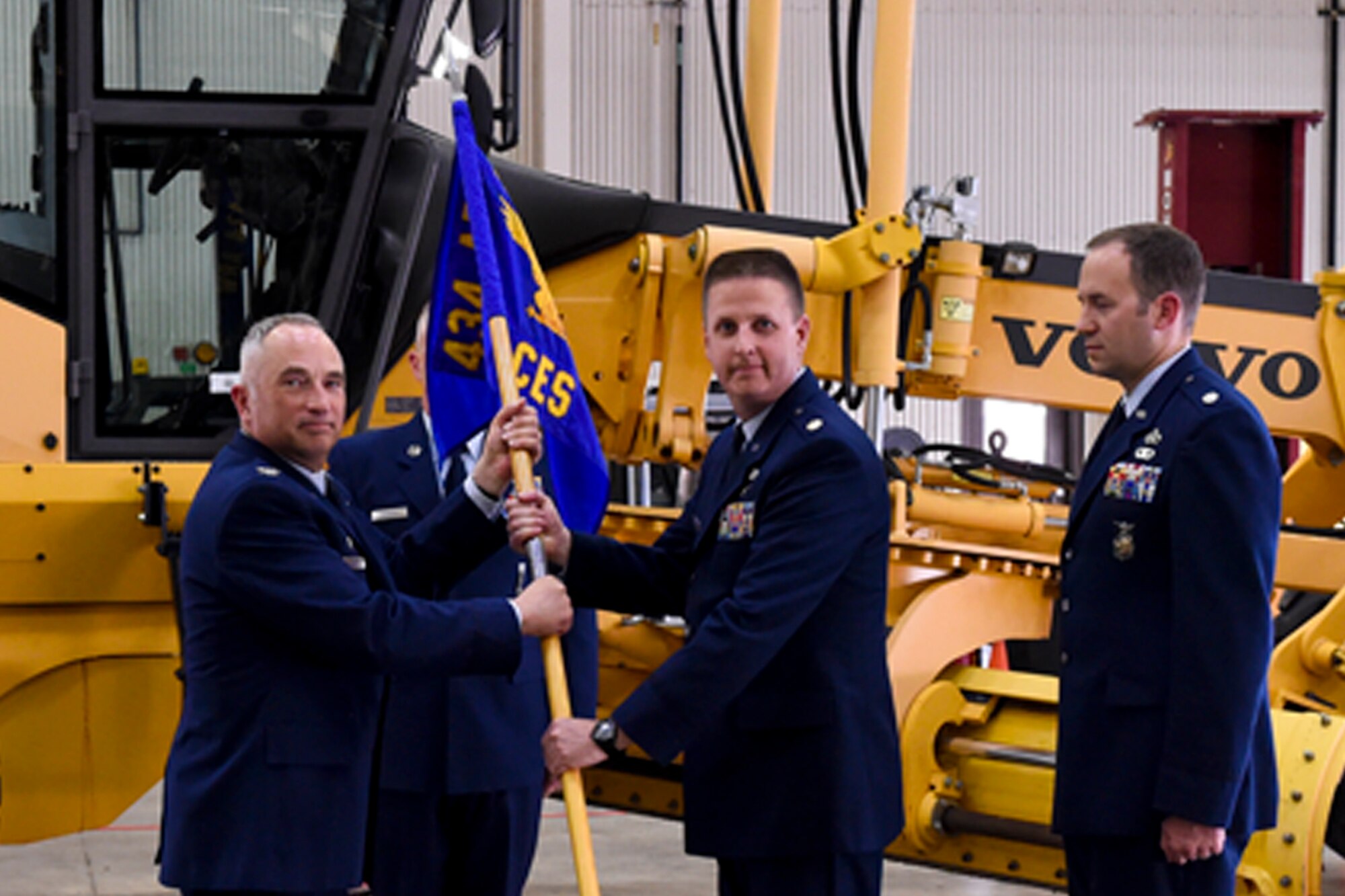 U.S. Air Force Maj. Timothy Kerrigan receives a guidon from Col. Scott Russell, 434th Mission Support Group commander during a change of command ceremony at Grissom Air Reserve Base, Ind., June 4, 2017. During the ceremony, Maj. Timothy Kerrigan took command of the 434th Civil Engineer Squadron. (U.S. Air Force photo/Senior Airman Cali Wetli) 