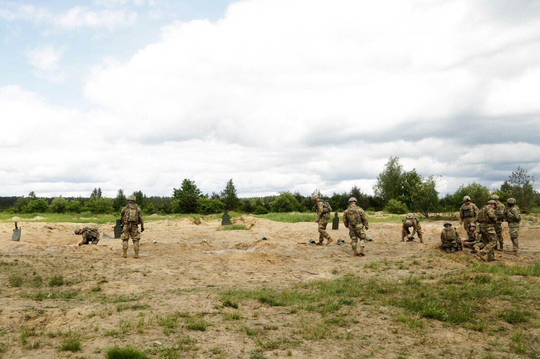 Army combat engineers prepare grapeshot charges during demolition training at the Bemowo Piskie training area in Poland, June 7, 2017. Saber Strike 17 is a U.S. Army Europe-led multinational combined forces exercise conducted annually to enhance the NATO alliance throughout the Baltic region and Poland. Army photo by Spc. Samuel Brooks