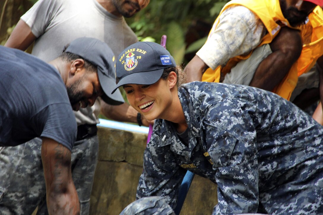 American sailors assigned to the Ticonderoga-class guided-missile cruiser USS Lake Erie work with Sri Lankan Marines and Red Cross personnel to support humanitarian assistance operations in the wake of severe flooding and landslides that devastated many regions of the country in Galle, Sri Lanka, June 13, 2017. Recent heavy rainfall brought by a southwestern monsoon triggered flooding and landslides throughout the country, displacing thousands of people and causing significant damage to homes and buildings. Navy photo by Ensign Nicholas Ransom