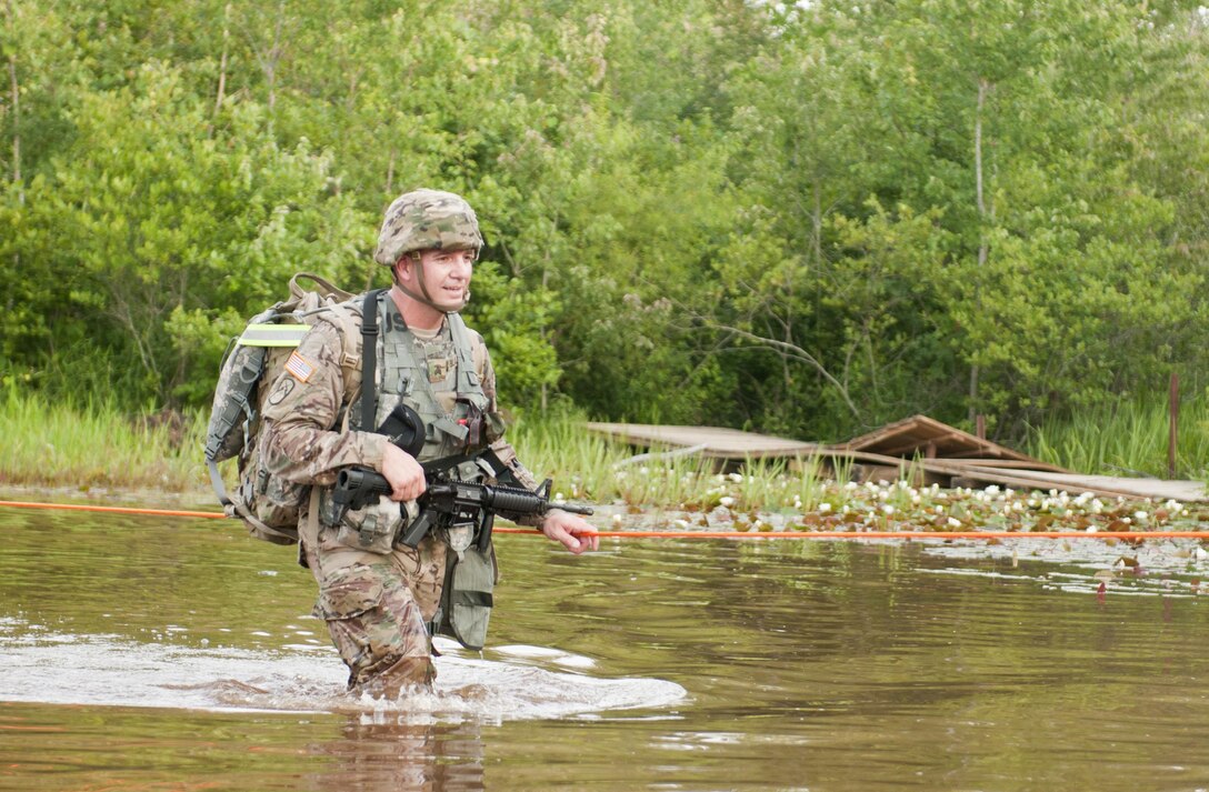 Sgt. David Blalock, of Wolf City, Texas, representing the 75th Training Command, crosses a water obstacle at the 2017 U.S. Army Reserve Best Warrior Competition at Fort Bragg, N.C. June 13. This year’s Best Warrior Competition will determine the top noncommissioned officer and junior enlisted Soldier who will represent the U.S. Army Reserve in the Department of the Army Best Warrior Competition later this year at Fort A.P. Hill, Va. (U.S. Army Reserve photo by Sgt. David Turner) (Released)