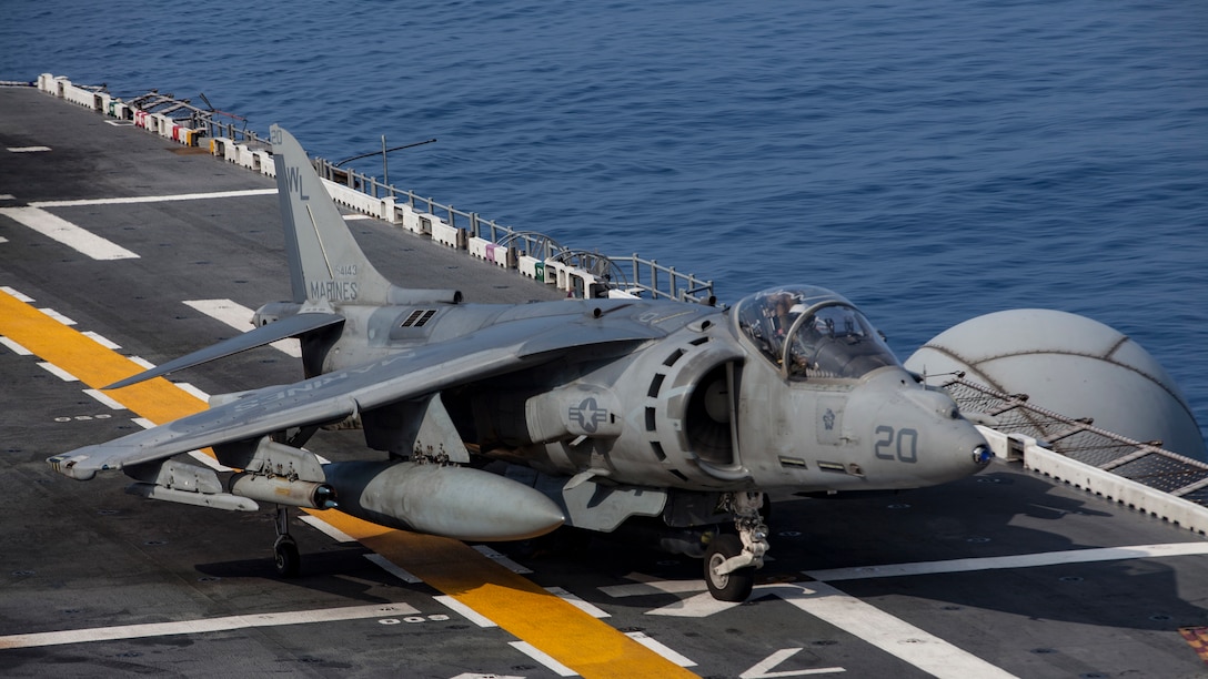 An AV-8B Harrier belonging to Marine Attack Squadron 311 taxis after landing aboard the USS Bonhomme Richard while underway in the Pacific Ocean, June 9, 2017. VMA-311 is the 31st Marine Expeditionary Unit’s fixed-wing attack asset and is currently attached to Marine Medium Tiltrotor Squadron 265, the 31st MEU’s Aviation Combat Element. During the flight the Harrier’s pilot fired the Advanced Precision Kill Weapon System, a laser-guided rocket, for the first time in the Indo-Asia-Pacific region. The 31st MEU partners with the Navy’s Amphibious Squadron 11 to form amphibious component of the Bonhomme Richard Expeditionary Strike Group. The 31st MEU and PHIBRON 11 combine to provide a cohesive blue-green team capable of accomplishing a variety of missions across the Indo-Asia-Pacific. 