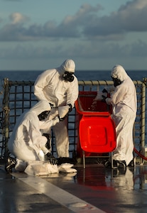 HMAS Arunta personnel dispose of 260kg of illegal narcotics seized on June 8, 2017 while on patrol in the Middle East region. HMAS Arunta operates as part of the multi-national Combined Maritime Forces, predominately tasked to support Combined Task Force 150 for counter-terrorism and maritime security operations. Arunta is deployed on Operation MANITOU, supporting international efforts to promote maritime security, stability and prosperity in the Middle East region (MER). (Photo courtesy of Royal Australian Navy)