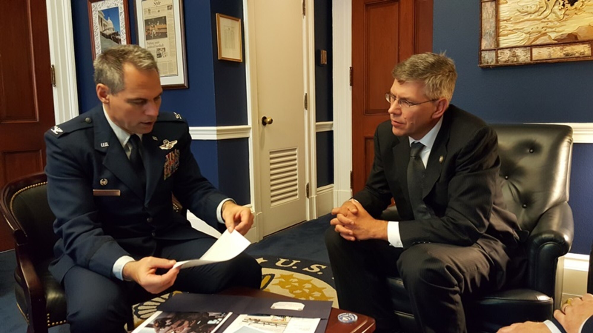 Rep. Erik Paulsen talks with Col. Tony Polashek, 934th Airlift Wing commander during his visit to his Washington D.C. office June 7. During the visit they discussed issues important to the Airmen of the 934th Airlift wing and Air force Reserve.