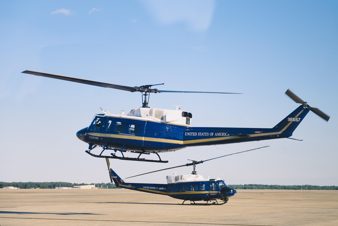A 1st Helicopter Squadron UH-1N Iroquois takes flight in support of the U.S. Air Force Band’s Heritage to Horizons concert series at Joint Base Andrews, Md., June 9, 2017. The flight allowed UH-1N crew members to train for high-priority airlift missions and defense support to civilian authorities. (U.S. Air Force photo by Senior Airman Delano Scott)   