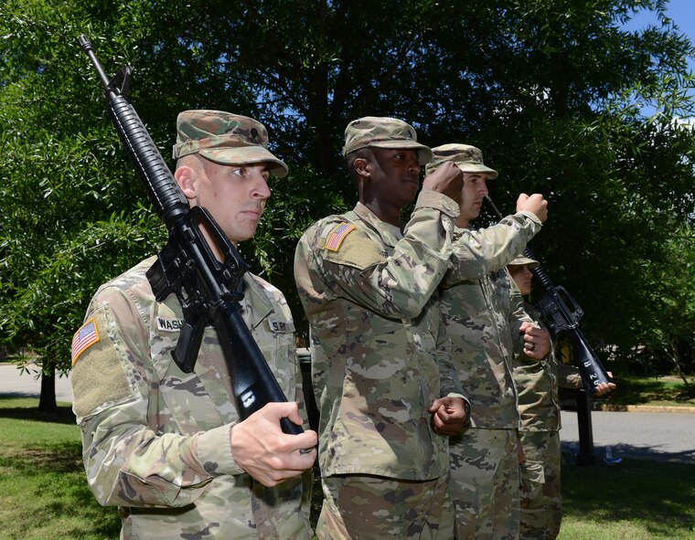 U.S. Army Soldiers from the Fort Eustis Color Guard practice presenting and posting the colors for a ceremony at Joint Base Langley-Eustis, Va., June 9, 2017. Honor guardsmen train daily to perfect their skills, and ensure all movements are precise and synchronized. (U.S. Air Force photo/Staff Sgt. Teresa J. Cleveland)