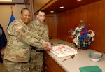 Army Chief Warrant Officer 3 Jemme Neal and Sgt. 1st Class Isaac Wilson, both from DLA Troop Support’s Subsistence supply chain, cut a cake June 13 to mark the Army’s 242nd birthday. Subsistence helped deliver 300,000 servings of birthday cake to dining facilities around the world.