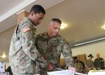 Soldiers with the 1st Sustainment Brigade out of Fort Riley, Kansas celebrate the Army's 242nd birthday in Vilnius, Lithuania during Operation Saber Strike 17. Saber Strike 17 is a multinational, U.S. Army Europe-led exercise designed to enhance interoperability among Allies and regional partners. 