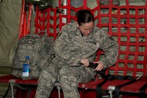 U.S. Air Force Reserve Staff Sgt. Rachel Clark, personnel journeyman, 913th Force Support Squadron, buckles in for a flight home June 4, 2017, at Keesler Air Force Base, Miss. Clark was a participant in the 913th Airlift Group’s first readiness exercise Prime Horizon, which took place simultaneously at both Little Rock and Keesler Air Force Bases. (U.S. Air Force photo by Master Sgt. Jeff Walston/Released)