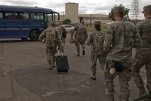 U.S. Air Force Reserve Airmen from the 913th Airlift Group board a bus on their way to a C-130J Super Hercules for a flight to Mississippi June 2, 2017, at Little Rock Air Force Base, Ark. Approximately 45 Airmen from the 913 AG deployed to Mississippi, taking part in the exercise designed to demonstrate the Group’s ability to deploy and re-deploy a two-ship package carrying passengers and cargo to a simulated deployed location. (U.S. Air Force photo by Master Sgt. Jeff Walston/Released)