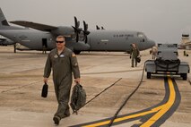 U.S. Air Force Reserve Lt. Col. Chris Dickens, assistant operations office, 327th Airlift Squadron and Capt. Benjamin Buchanan, chief of safety, 327 AS, transfer paperwork between aircraft for a “tailswap” inject during exercise Prime Horizon June 3, 2017, at Keesler Air Force Base, Miss. A “tailswap” is an unanticipated change of aircraft that demonstrates the ability of the Airmen to respond to rapid mission changes. (U.S. Air Force photo by Master Sgt. Jeff Walston/Released)