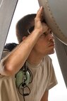 U.S. Air Force Reserve Tech Sgt. Jimme McDougall, crew chief, 913th Aircraft Maintenance Squadron, performs an examines the intake for an I&Es (Inlet and Exhaust) inspection at Keesler Air Force Base, Miss., June 3, 2017. McDougall was one of several maintainers from the 913 MXS who provided maintenance support to aircraft at Keesler during the 913th Airlift Group’s first readiness exercise. (U.S. Air Force photo by Master Sgt. Jeff Walston/Released)