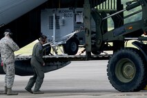 U.S. Air Force Reserve Tech Sgt. Nate Castle, loadmaster, 327th Airlift Squadron, oversees the loading of a C-130J Super Hercules during Exercise Prime Horizon June 3, 2017, at Little Rock Air Force Base, Ark. Castle was one of many participants in the 913th Airlift Group’s first readiness exercise, which took place simultaneously at both Little Rock and Keesler Air Force Bases. (U.S. Air Force photo by Airman 1st Class Codie Collins/Released)