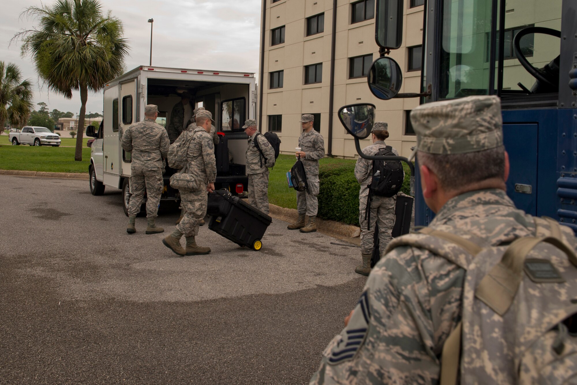 U.S. Air Force Reserve Airmen from the 913th Airlift Group board load luggage on a bread truck before boarding a C-130J Super Hercules for a flight back to Arkansas June 4, 2017, at Keesler Air Force Base, Miss. Approximately 45 Airmen from the 913 AG deployed to Keesler, taking part in Prime Horizon, an exercise designed to demonstrate the Group’s ability to deploy and re-deploy a two-ship package carrying passengers and cargo to a simulated deployed location. (U.S. Air Force photo by Master Sgt. Jeff Walston/Released)