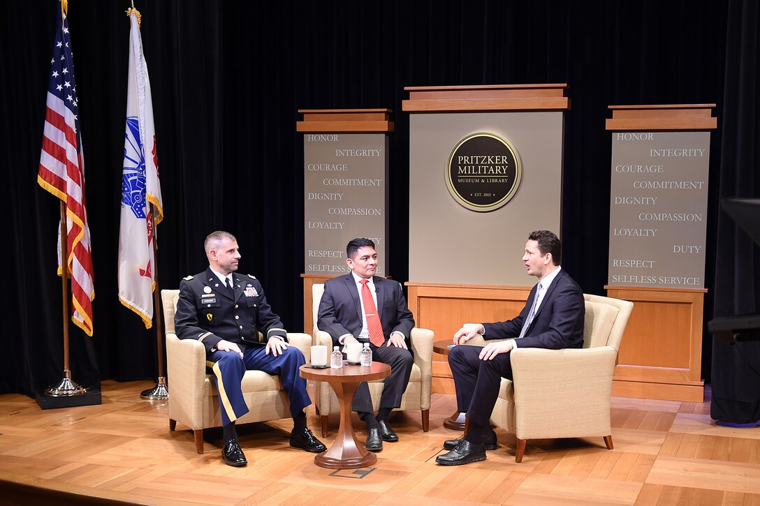 U.S. Army Reserve Lt. Col. Daniel Jaquint, left, Chief of Staff, 85th Support Command and Mr. Anthony Taylor, center, Public Affairs Specialist, 85th Support Command, take part in a live tap-ing interview discussing the 100-year anniversary of the 85th Support Command at the Pritzker Military Museum & Library in Chicago, June 5, 2017. The interview focused on the 85th Sup-port Command’s 100-year history dating back to World War I, when it was activated as an active Army component; it also included a discussion on the 85th Spt. Cmd.’s current role as a reserve component. During the interview Jaquint and Taylor both spoke about the importance of the Army Reserve in today’s climate. Jaquint emphasized that with some of the actions seen making headlines, the 85th Support Command has a vital role, partnered with First Army, to ensure the readiness and training of Soldiers ahead of mobilizations and deployments to meet the opera-tional needs of the Army and the Joint Warfighter.
(U.S. Army Photo by Sgt. Aaron Berogan/Released)