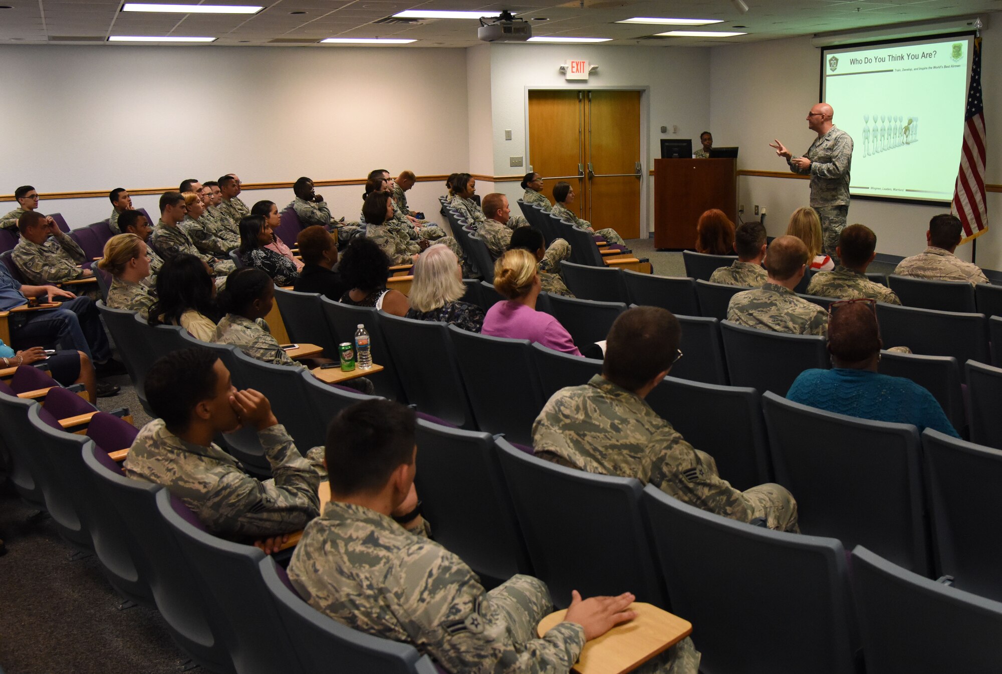 Capt. Adam Dell, 81st Medical Operations Squadron mental health flight commander, provides a suicide prevention briefing to members of the 81st Training Wing staff agency at the Sablich Center June 12, 2017, on Keesler Air Force Base, Miss. The briefing was one of several Wingman Week events focusing on resiliency and teambuilding initiatives across the base. (U.S. Air Force photo by Kemberly Groue)