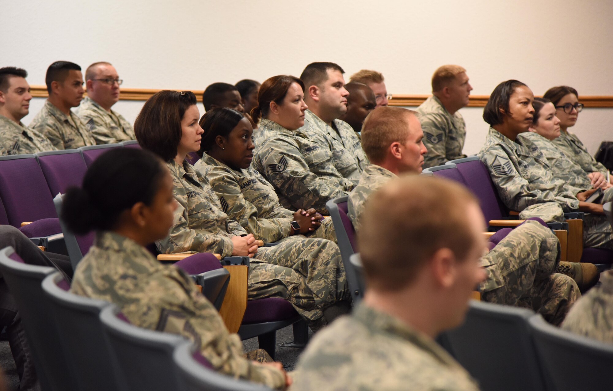 Members of the 81st Training Wing staff agency attend a suicide prevention briefing at the Sablich Center June 12, 2017, on Keesler Air Force Base, Miss. The briefing was one of several Wingman Week events focusing on resiliency and teambuilding initiatives across the base. (U.S. Air Force photo by Kemberly Groue)