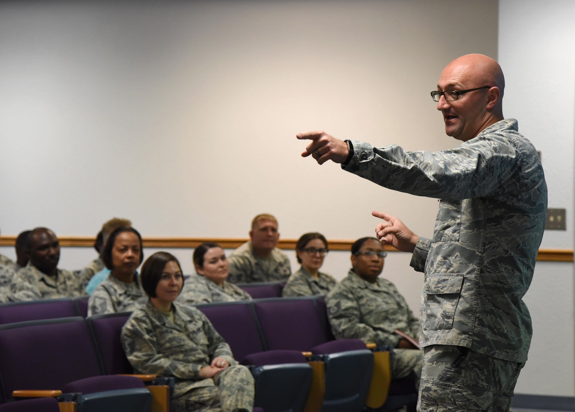 Capt. Adam Dell, 81st Medical Operations Squadron mental health flight commander, provides a suicide prevention briefing to members of the 81st Training Wing staff agency at the Sablich Center June 12, 2017, on Keesler Air Force Base, Miss The briefing was one of several Wingman Week events focusing on resiliency and teambuilding initiatives across the base. (U.S. Air Force photo by Kemberly Groue)