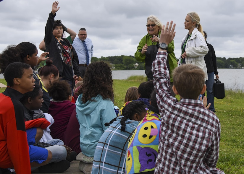 Betsy McAllister, Hampton City Schools science teacher specialist, and Karen Brace, Booker Elementary School science teacher, instruct students during an oyster planting event at Joint Base Langley-Eustis, Va., June 8, 2017. Since oysters are filter feeders, they improve water quality and consume phytoplankton in the surrounding water. (U.S. Air Force photo/Airman 1st Class Anthony Nin Leclerec)