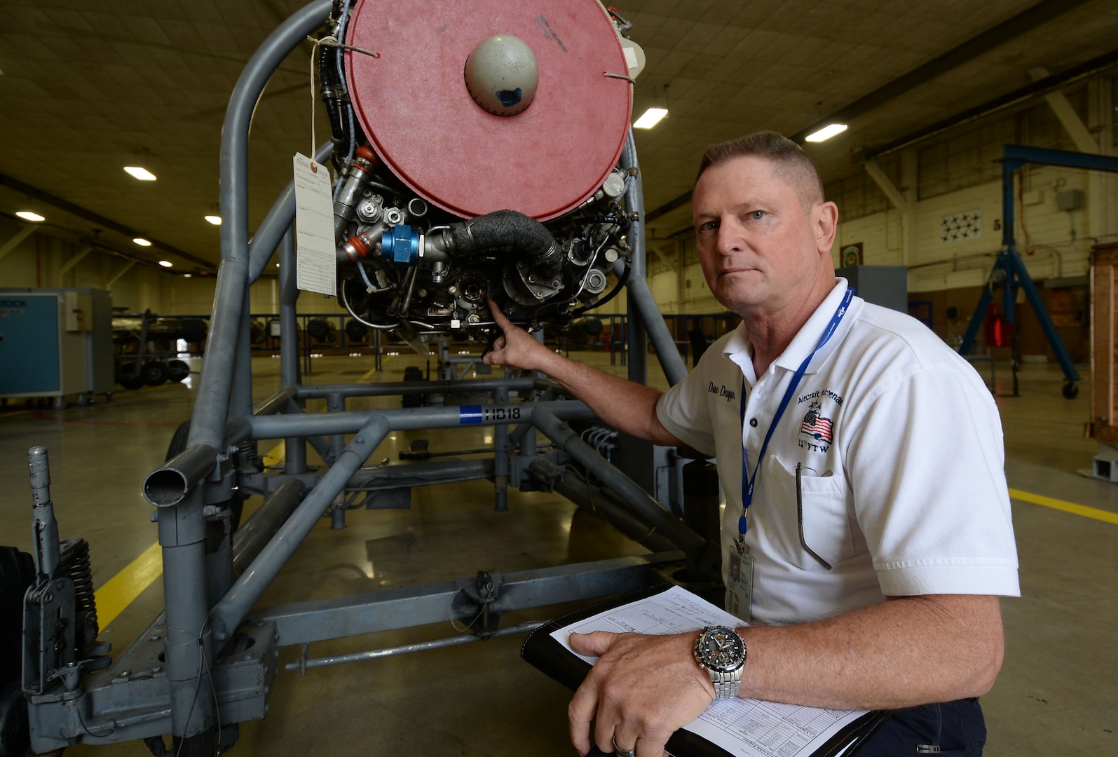 Dave Duggar, propulsion shop supervisor, points to the gearbox pad of a J-85 engine for a T-38C Talon inside Hangar 5 at Joint Base San Antonio-Randolph, Texas, May 8, 2017.