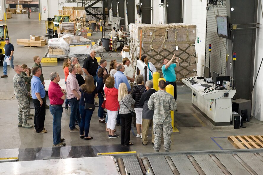 Mike Williams, 436th Aerial Port Squadron air freight supervisor, explains the cargo building and tracking process used in the Super Port to Joint Base Lewis-McChord, Wash., honorary commanders and civic leaders June 8, 2017, on Dover Air Force Base, Del. Dover’s Super Port has been chosen by Air Mobility Command to be used as a model for all other aerial ports in the Air Force. (U.S. Air Force photo by Roland Balik)