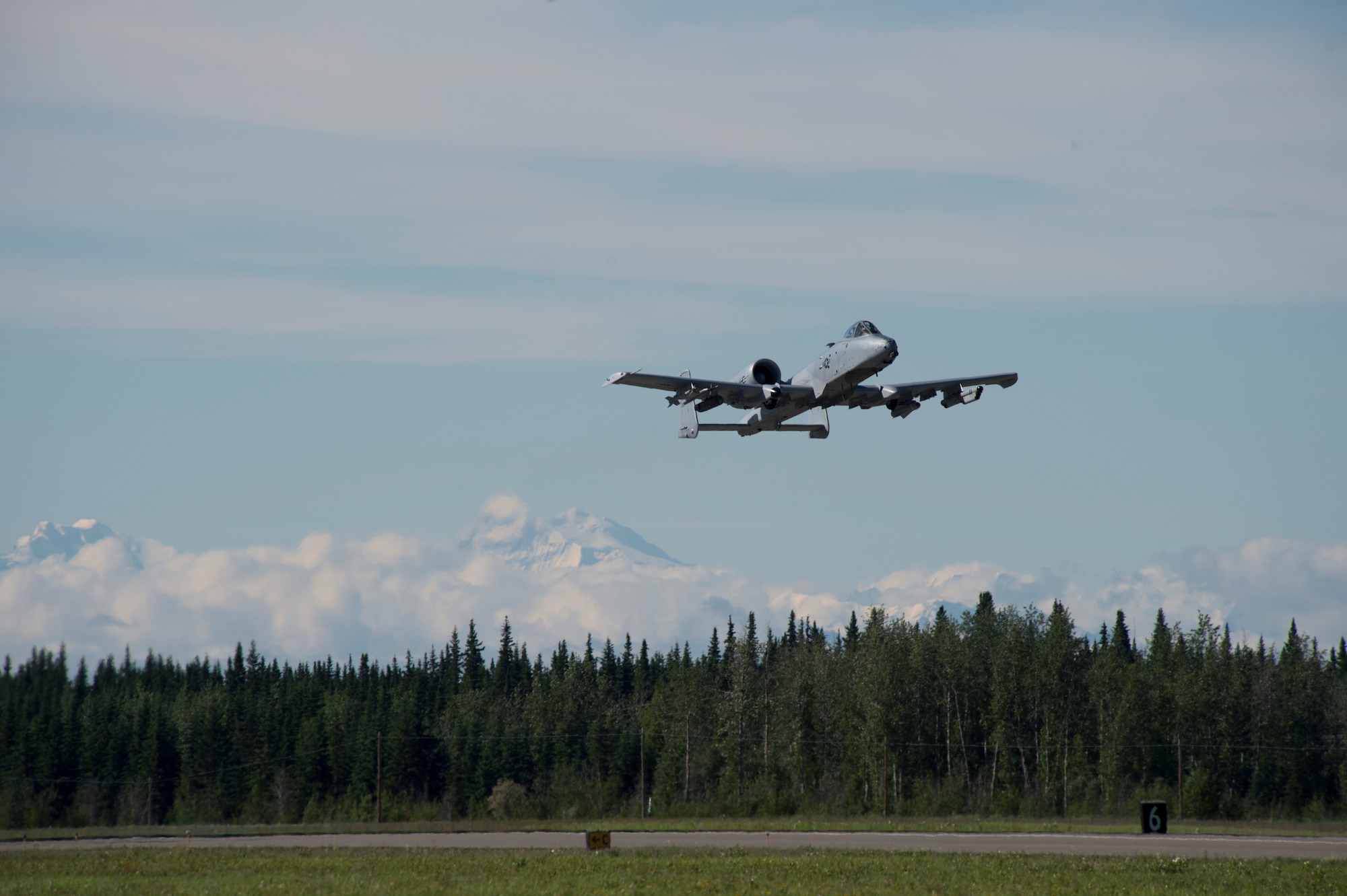 A U.S. Air Force A-10 Warthog takes off from the flight line during RED FLAG-Alaska 17-2 June 13, 2017, at Eielson Air Base, Alaska. RED FLAG-Alaska provides an optimal training environment in the Indo-Asia Pacific Region and focuses on improving ground, space, and cyberspace combat readiness and interoperabillity for U.S. and international forces.  (U.S. Air Force photo by Airman 1st Class Haley D. Phillips)