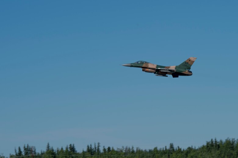 A U.S. Air Force F-16 Aggressor takes off from the flight line during RED FLAG-Alaska 17-2 June 13, 2017, at Eielson Air Base, Alaska. RED FLAG-Alaska provides an optimal training environment in the Indo-Asia Pacific Region and focuses on improving ground, space, and cyberspace combat readiness and interoperabillity for U.S. and international forces.  (U.S. Air Force photo by Airman 1st Class Haley D. Phillips)