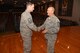 Chief Master Sgt. Stephen Brown congratulates Citizen Airmen of the 507th Air Refueling Wing during commander's call May 7, 2017, at the Tinker Air Force Base, Okla. Brown served as command chief for 5 years, and when he retires in July, he will have served 32 years in the Air Force, Air Force Reserve, and the Air National Guard. (U.S. Air Force photo/Master Sgt. Grady Epperly)