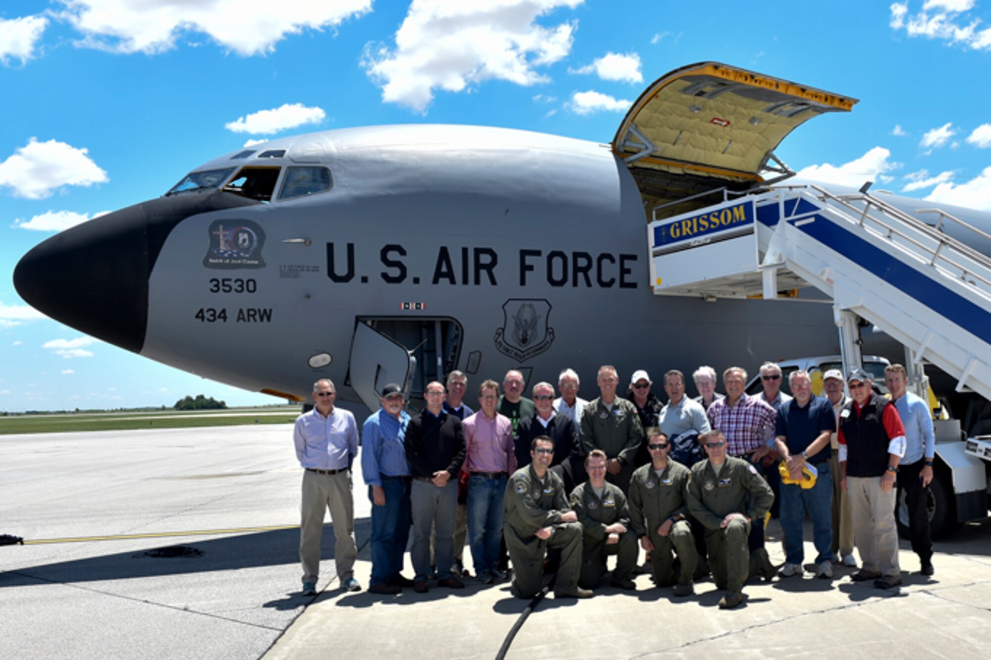 Indiana civic leaders pose with Col. Larry Shaw, 434th Air Refueling Wing commander and air crew after a flight at Grissom Air Reserve Base, Ind., June 6, 2017. The members were selected by leadership to get a first-hand look at the unit’s mission. (U.S. Air Force photo/Senior Airman Cali Wetli)