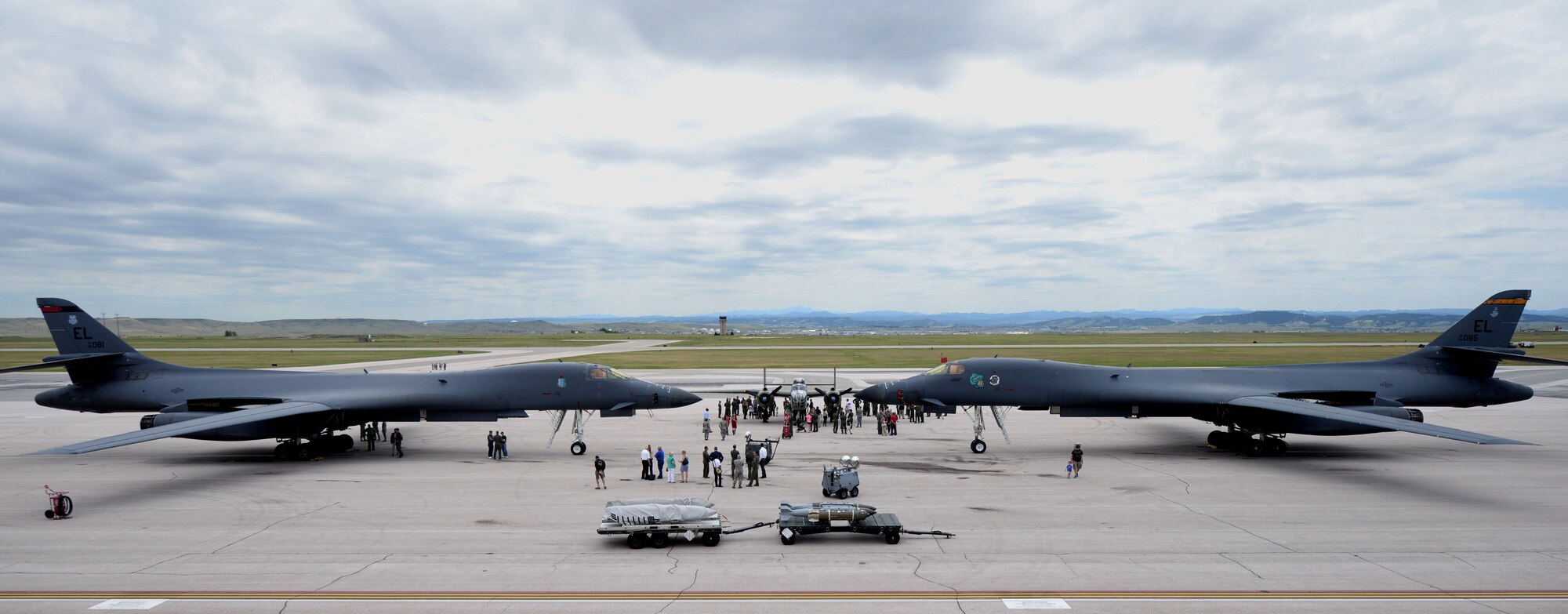 Airmen and their families attend a static display at Ellsworth Air Force Base, S.D., June 12, 2017. Two B-1 bombers, a B-52 Stratofortress and a B-25 Mitchell bomber were on display for the 100th birthday of the 34th and 37th Bomb Squadrons. (U.S. Air Force photo by Senior Airman Denise Jenson)