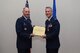 U.S. Air Force Col. Michael Downs, 17th Training Wing Commander, presents a Meritorious Service certificate to Col. Steven Van De Walle, 17th Medical Group Commander, at the Event Center on Goodfellow Air Force Base, Texas, June 13, 2017. The event honored Van De Walle’s service to his unit and welcomed its new commander Col. Janet Urbanski. (U.S. Air Force photo by Airman 1st Class Chase Sousa/Released)